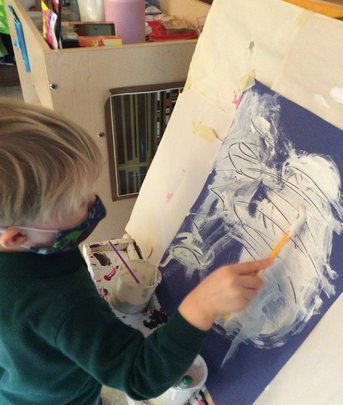 B painting a Yeti from How to Catch a Yeti